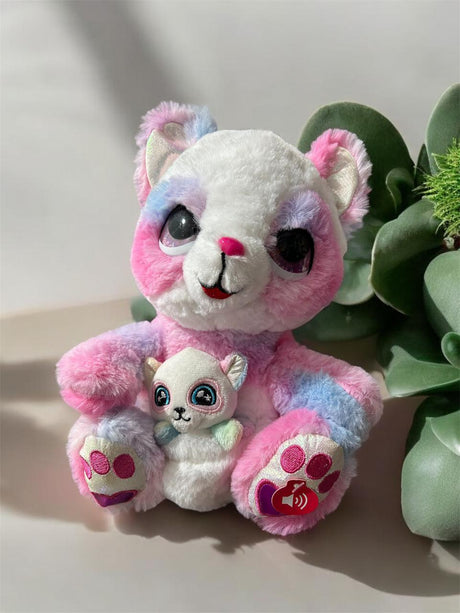 Pink and lilac tie dye plush holding a small matching baby plush between its paws