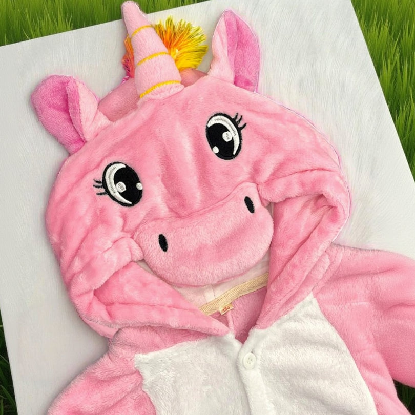 Close view of the pink unicorn hood with a horn and big eyes