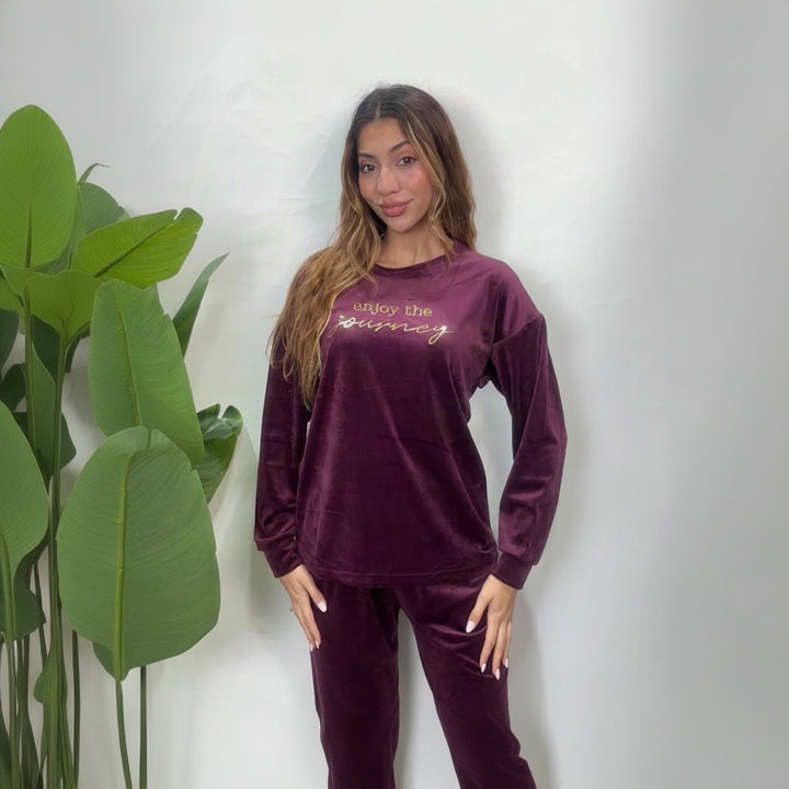 Plum velvet pajama top with gold Enjoy The Journey script, worn with matching pants