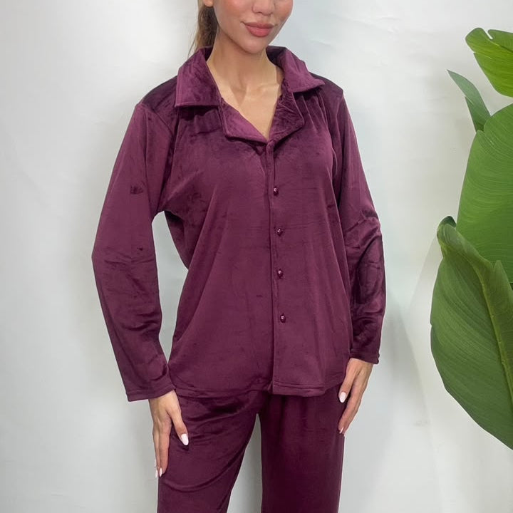Close up of a plum purple velvet pajama shirt with collar and buttons