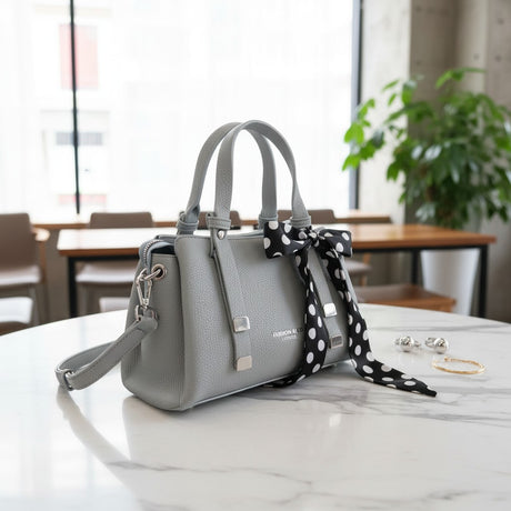 Grey mini handbag with detachable crossbody strap and polka dot scarf bow