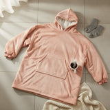 Soft pink hooded blanket laid flat showing the roomy hood and large front pocket