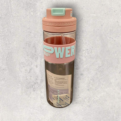 Peach Power water bottle with a pink lid on a grey backdrop