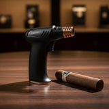 Butane lighter and cigar on a wooden surface with blurred background