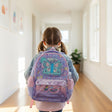 Girl wearing a purple butterfly school backpack in a corridor – Jack Gifts Online Lebanon