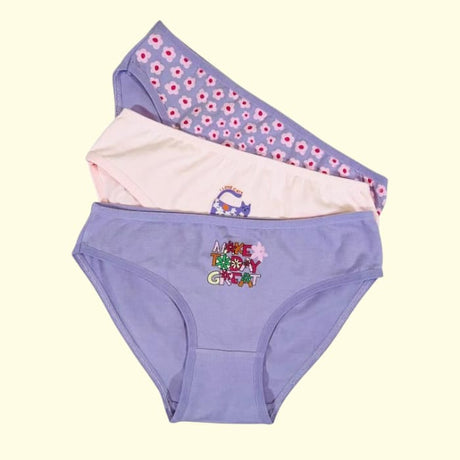 Three girls cotton briefs in lilac, floral and peach folded together