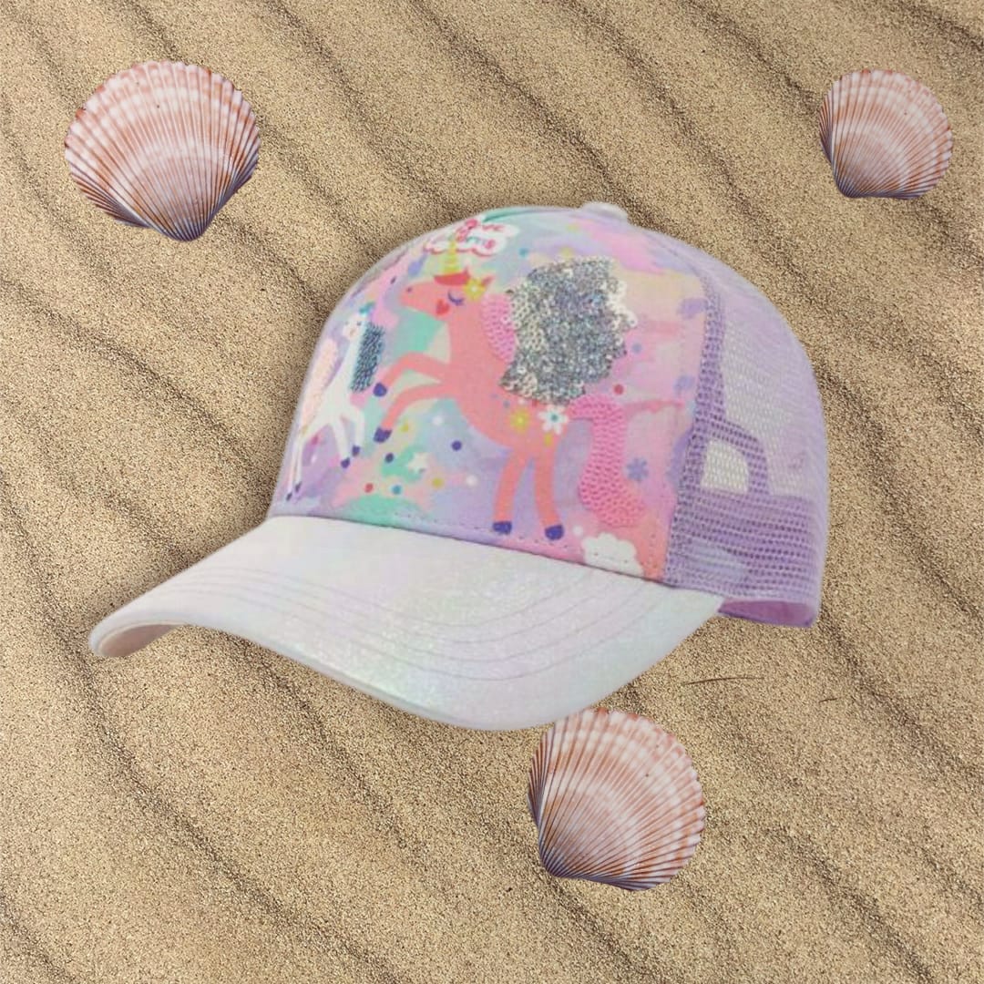 Purple unicorn kids cap with a silver sequin cloud, pastel mesh back and white brim on sand