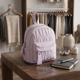 Lilac quilted mini backpack with chevron stitching and silver hardware
