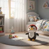 Red beanie hat penguin plush on nursery rug