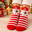 Red and white striped Christmas socks with a white puppy face at the cuff, worn by a Christmas tree