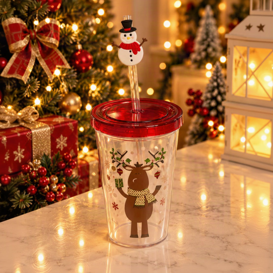Clear straw tumbler with a reindeer print, red screw lid and a snowman straw topper