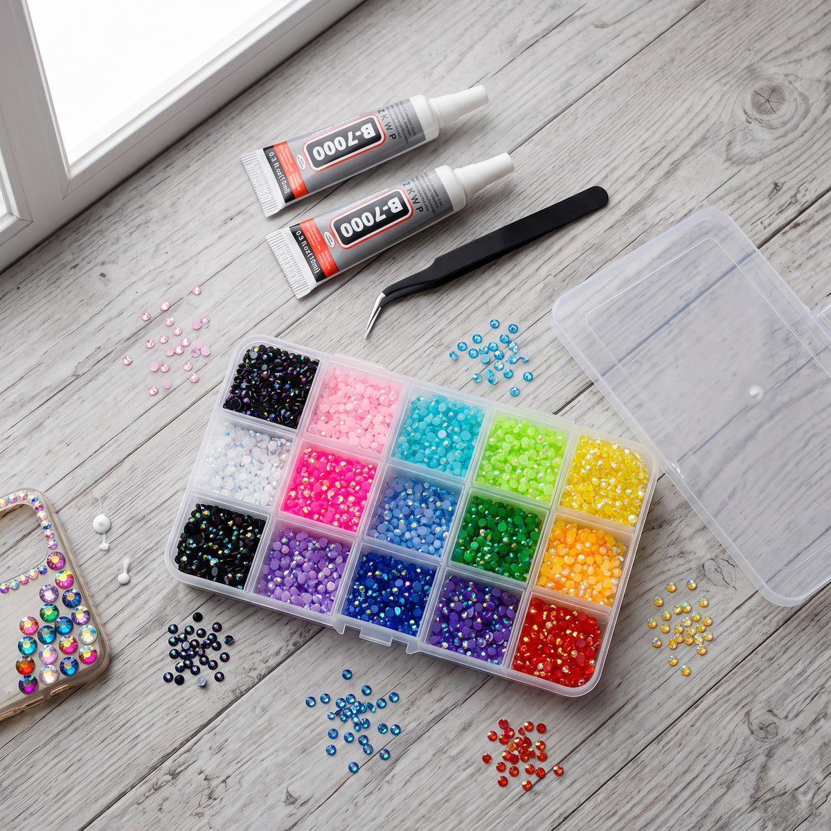 Rhinestone craft kit with 15 colours of flat back gems, glue tubes and tweezers