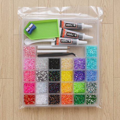 Rhinestone craft kit with 28 colour compartments, glue, drill tray and wax pencils