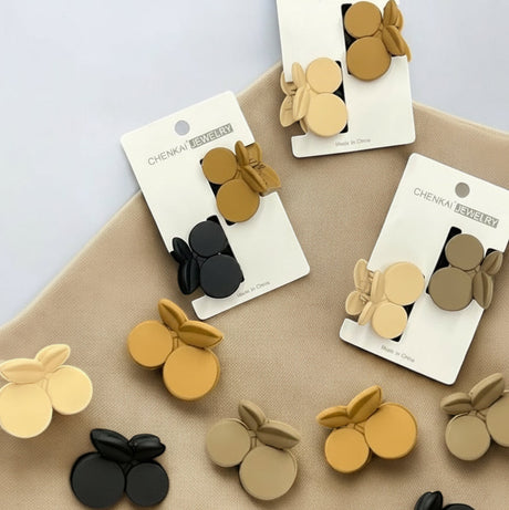 Round petal claw clips in beige, mustard, brown and black, Jack Gifts Online Lebanon