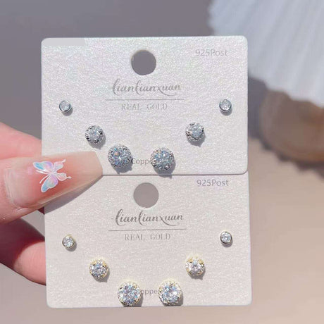 Three pairs of round crystal solitaire stud earrings in graduated sizes, Jack Gifts Online Lebanon