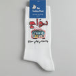 White sock with Arabic text and pixel art design on a white background
