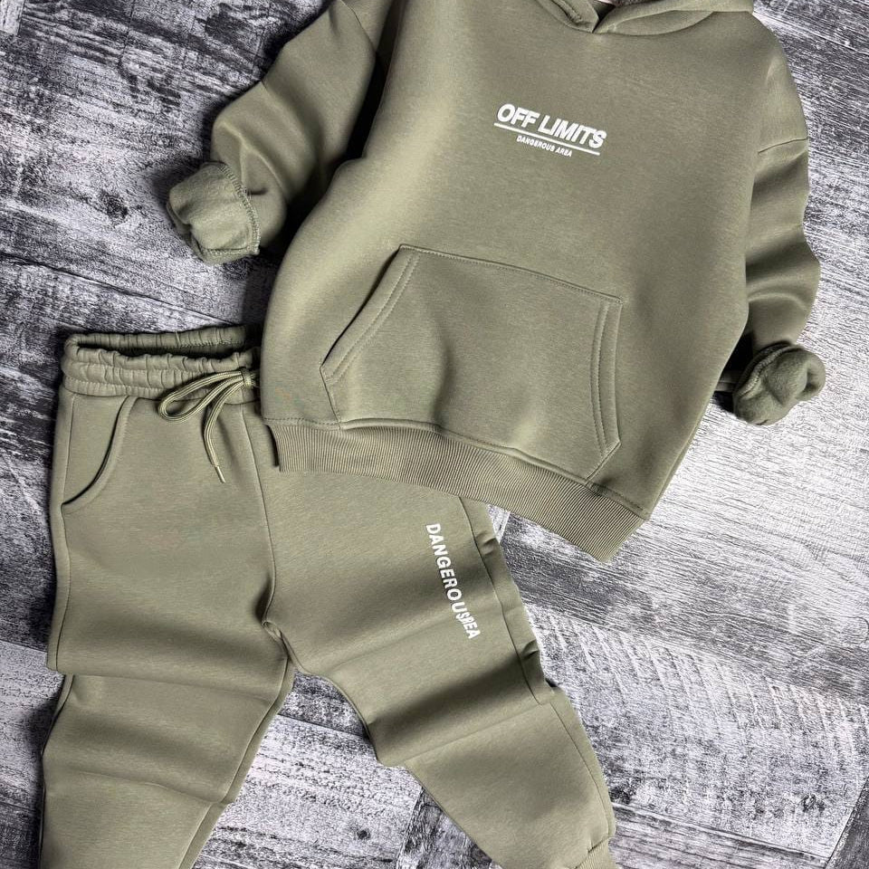 Sage green hoodie with kangaroo pocket and cuffed joggers laid flat