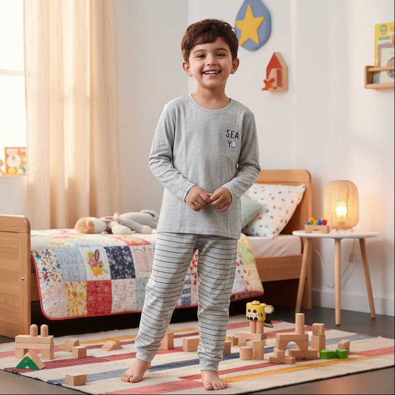 Kids grey pajama set with Sea You chest print and striped pants