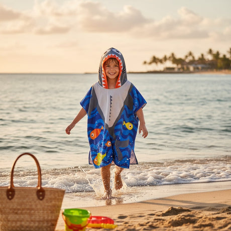 Boy in a shark hooded poncho towel with fish print at the sea – Jack Gifts Online Lebanon