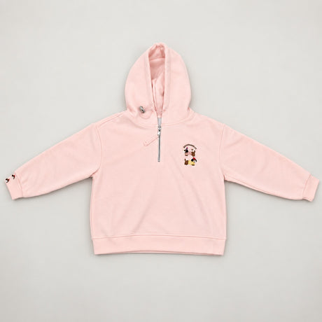 Blush pink hoodie flat on a plain background with its silver zip pulled halfway