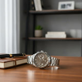 Silver stainless steel chronograph watch with textured grey dial