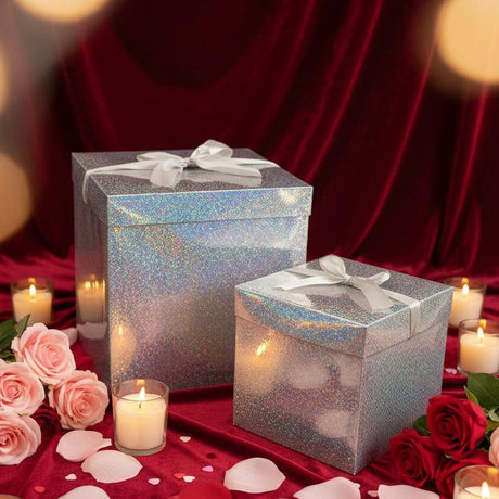 Holographic silver gift boxes with bows by candlelight