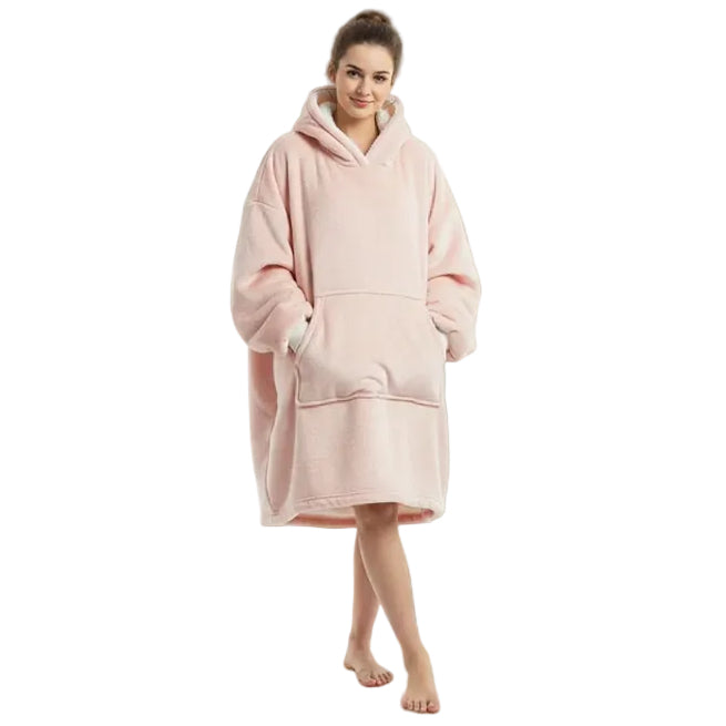 Person wearing a soft pink hooded blanket on a white background