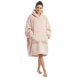 Palest blush wearable blanket in deep brushed pile, photographed on white, ivory lined hood down