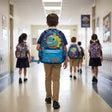 Boy wearing a navy space dino school backpack in a school corridor – Jack Gifts Online Lebanon
