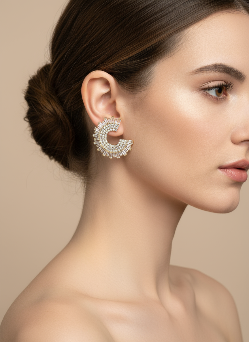 Close-up of a woman wearing a decorative spikey earring against a beige background