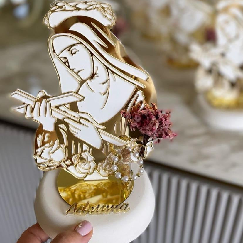 Veiled saint under a crown of thorns holding a crucifix, roses cut into her skirt