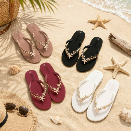 Starfish embellished flip flops in blush, black, burgundy and white on beach sand, Jack Gifts Online Lebanon
