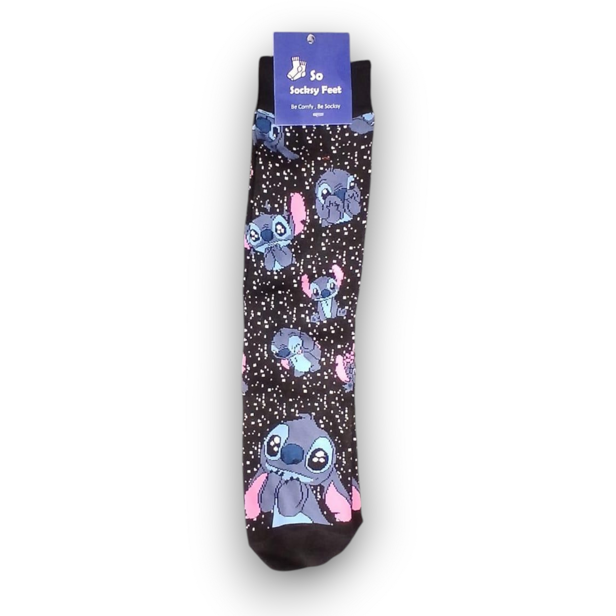 Single black kids sock laid flat with Stitch faces, pink flowers and white speckled star print