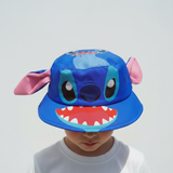 Child wearing a blue bucket hat with a Stitch face and soft pink ears on the sides
