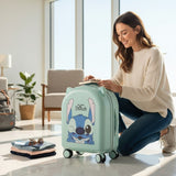 Woman preparing to travel with a green suitcase featuring a stitch cartoon character in a modern living room