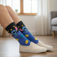 Kids blue knee high socks with yellow pineapples, stars and a Stitch face on the black cuff