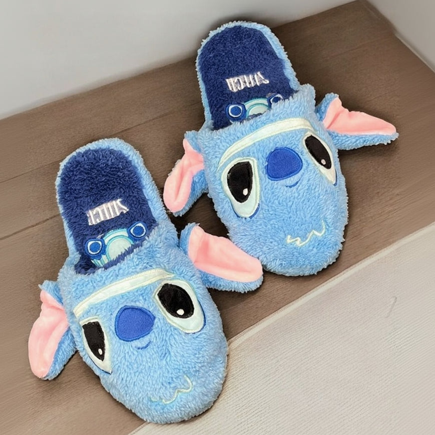 Empty pair showing Stitch embroidered in white on the navy terry insole