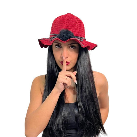 Red wavy brim hat worn with long dark hair