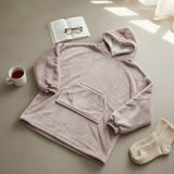 Taupe hooded blanket laid flat showing the sherpa lined hood and front pocket