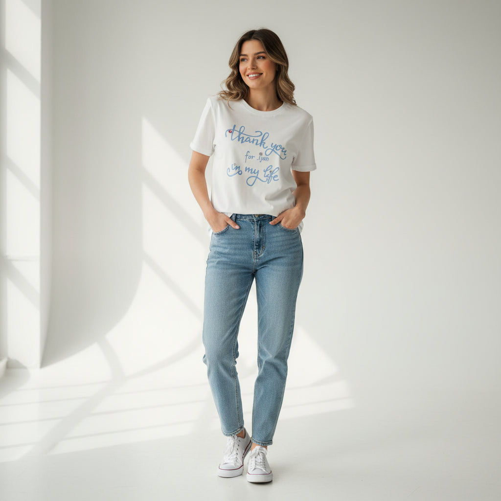 The same script in light blue on a white tee