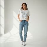 The same script in light blue on a white tee