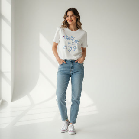 The same script in light blue on a white tee