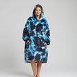 Cobalt, charcoal and white cracked marbling on a full length wearable blanket, hood raised