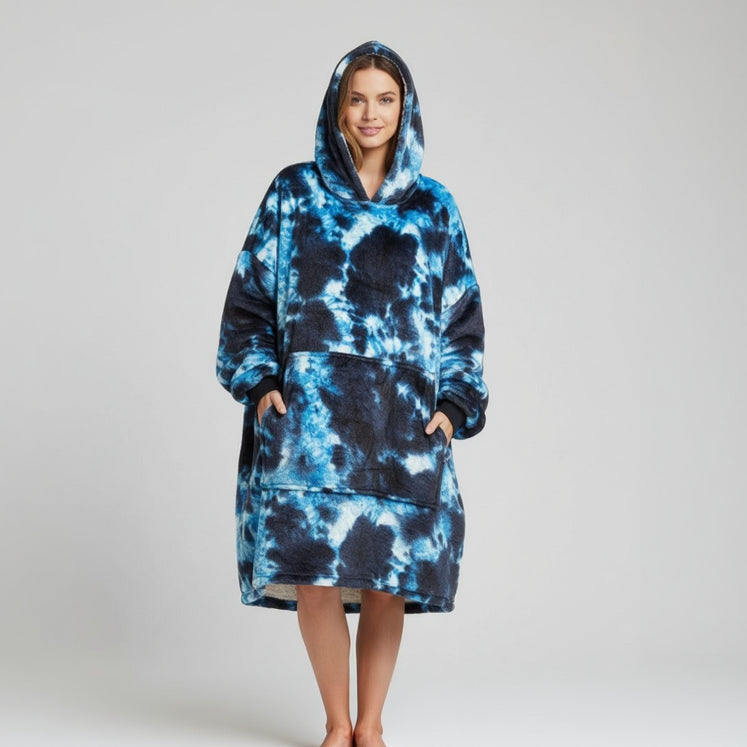 Cobalt, charcoal and white cracked marbling on a full length wearable blanket, hood raised