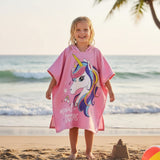 Girl in a pink unicorn Magical Dreams hooded poncho towel – Jack Gifts Online Lebanon