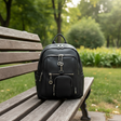 Angled view of the urban backpack showing its silver zipper hardware