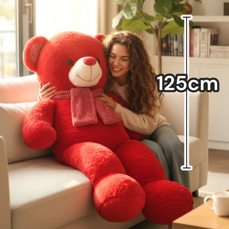 Woman hugging the red teddy bear on a sofa beside a 125cm measuring line
