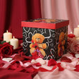 Black gift box with red hearts and a teddy bear print