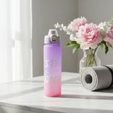 Lilac gradient frosted ombre water bottle printed with bold 'STRONG' text