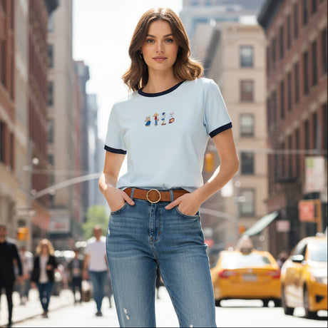 White t-shirt with cartoon character design on a dark surface